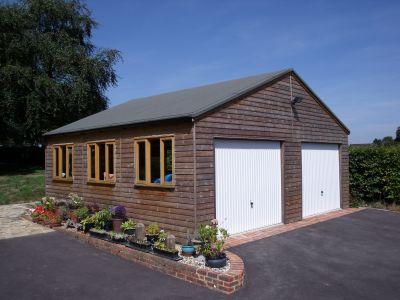 7.2m x 6.6m (24' x 22') Double Wooden Garage with 2 white painted garage doors