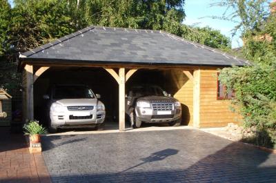 5.4m x 5.4m (18' x 18') 2 bay Carriage House with 3.0m x 5.4m (10' x 18') attached Workshop with 30° pitch natural slate roof and full hips