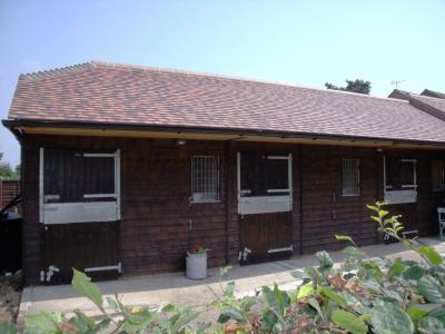 3 no. 3.6m x 3.6m (12' x 12') Loose Boxes with 35° pitch plain tile roof