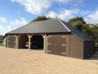 Pic 14. 6.0m x 6.0m 2 bay Carriage House with 2 4.2m x 6.0m attached Cart Lodges with slate roof