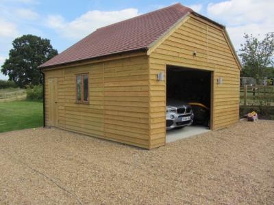 Pic 37. 6.0m x 5.4m Garage with plain tile roof and front barn hip