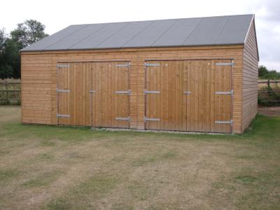Pic 42. 7.2m x 5.4m Garage with felt roof and doors offset in side wall elevation