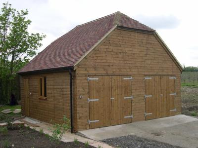 Pic 16. 6.0m x 5.4m Garage with tiled roof and barn hips