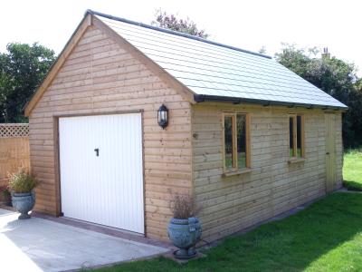 Pic 21. 7.2m x 4.2m Garage with slate roof