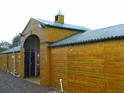Pic 14. Ride Through Archway - Note corrugated steel roof and Clock Tower